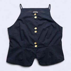 Black peplum tank top with heavy gold buttons and a high neckline